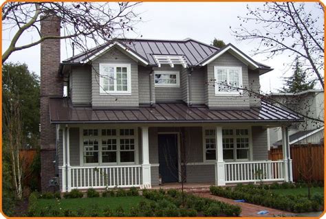 white house with tan metal roof|brown tin roof house.